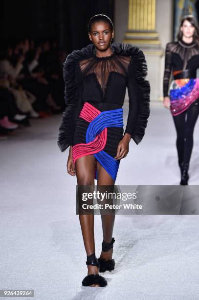 Amilna Estevao walks the runway during the Balmain show as part of the Paris Fashion Week Womenswear Fall/Winter 2018/2019 on March 2, 2018 in Paris,...