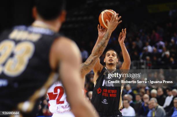 Jaime Smith and Christian Burns of MIA competes with Jordan Theodore of EA7 during the match quarter final of Coppa Italia between Olimpia EA7 Armani...