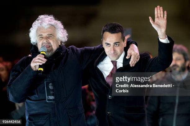Comedian and founder of the Five Stars Movement Beppe Grillo and Leader and Candidate of Five stars Movement Luigi di Maio attend the closing rally...
