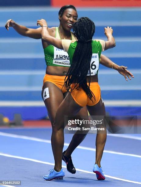 Birmingham , United Kingdom - 2 March 2018; Murielle Ahouré, right, and Marie-josée Ta Lou of Ivory Coast celebrate winning gold and silver...