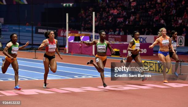 Birmingham , United Kingdom - 2 March 2018; Murielle Ahouré of Ivory Coast, centre, crosses the line to win the Women's 60m Final, ahead of...