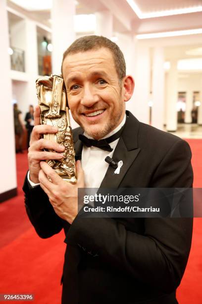 Dany Boon poses with the best public audience Award during the Cesars Film Award at Salle Pleyel on March 2, 2018 in Paris, France.