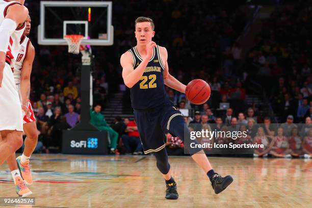 Michigan Wolverines guard Duncan Robinson during the second half of a quarter final round Big Ten Tournament College Basketball Game between the...