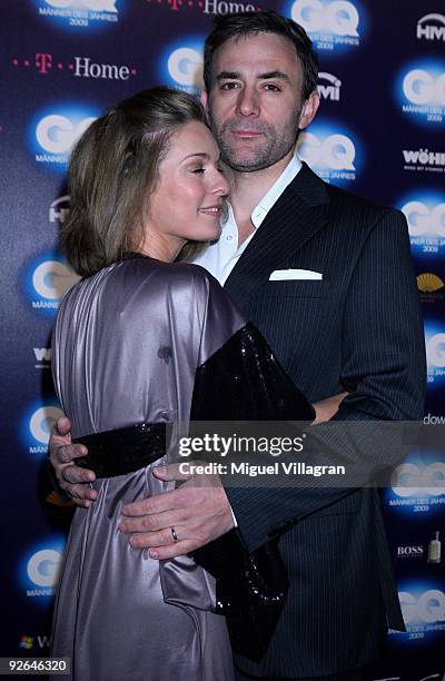 Actress Lisa Martinek and friend Guilio Ricciarelli arrive on the red carpet prior to the GQ Men Of The Year 2009 award ceremony on November 3, 2009...