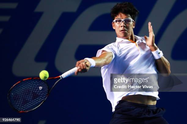 Hyeon Chung of Korea takes a forehand shot during the match between Hyeon Chung of Korea and Kevin Anderson of South Africa as part of the Telcel ATP...