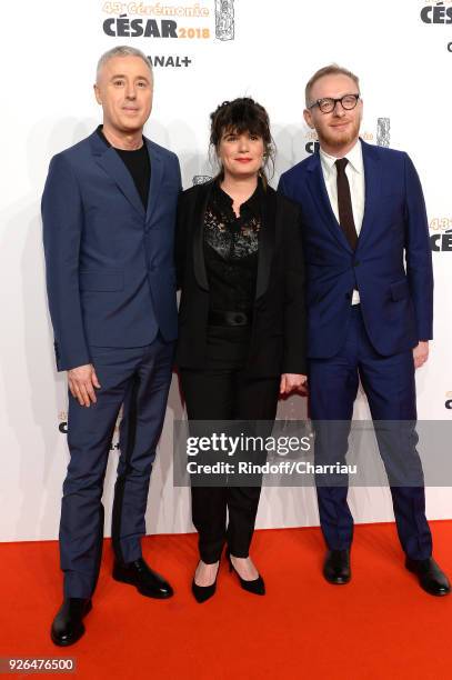 Romain Campillo, Clare Stewart and a guest arrive at the Cesar Film Awards 2018 at Salle Pleyel on March 2, 2018 in Paris, France.