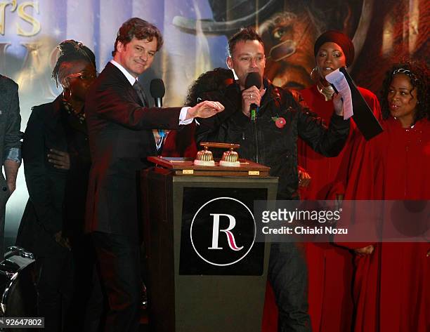 Colin Firth and Toby Anstis attend the annual switch on of Regent Street Christmas Lights on November 3, 2009 in London, England.