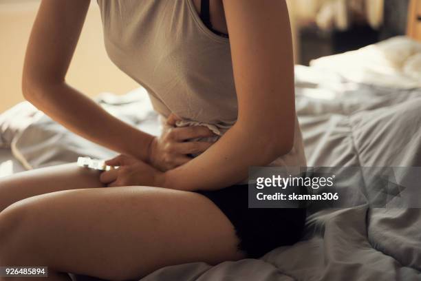 female feel hurt and pain on period - period bildbanksfoton och bilder