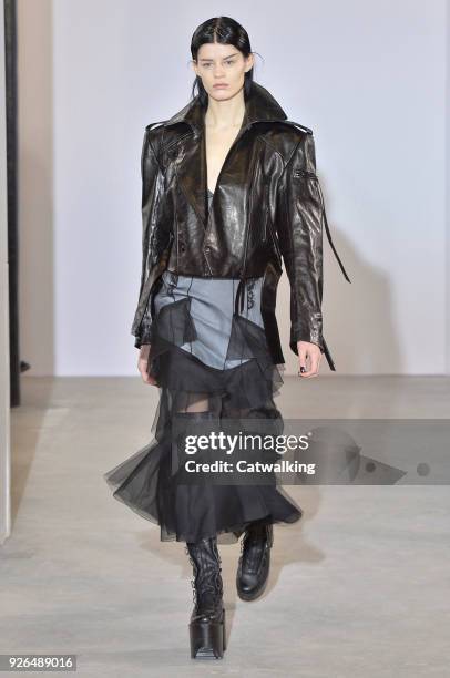 Model walks the runway at the Olivier Theyskens Autumn Winter 2018 fashion show during Paris Fashion Week on March 2, 2018 in Paris, France.