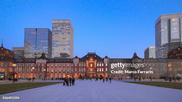 the reborn tokyo station at dusk, and the central part of tokyo, which is centered about tokyo station, marunouchi commercial district, japan - tokyo station stock pictures, royalty-free photos & images