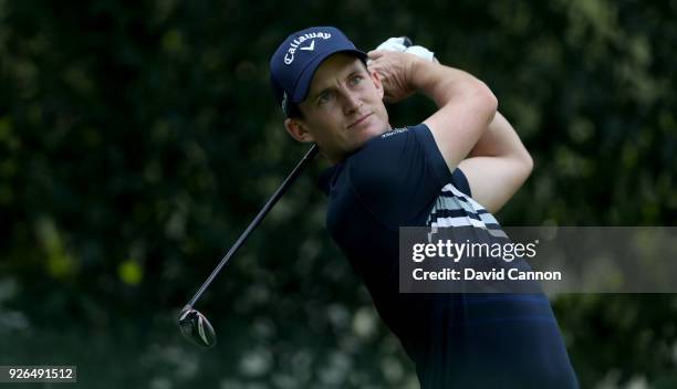 Chris Paisley of England plays his tee shot on the par 4, 12th hole during the second round of the World Golf Championships-Mexico Championship at...