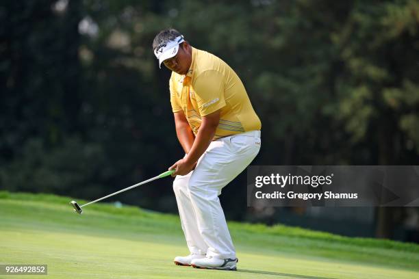 Kiradech Aphibarnrat reacts after missing a birdie putt on the 3rd hole during the second round of World Golf Championships-Mexico Championship at...