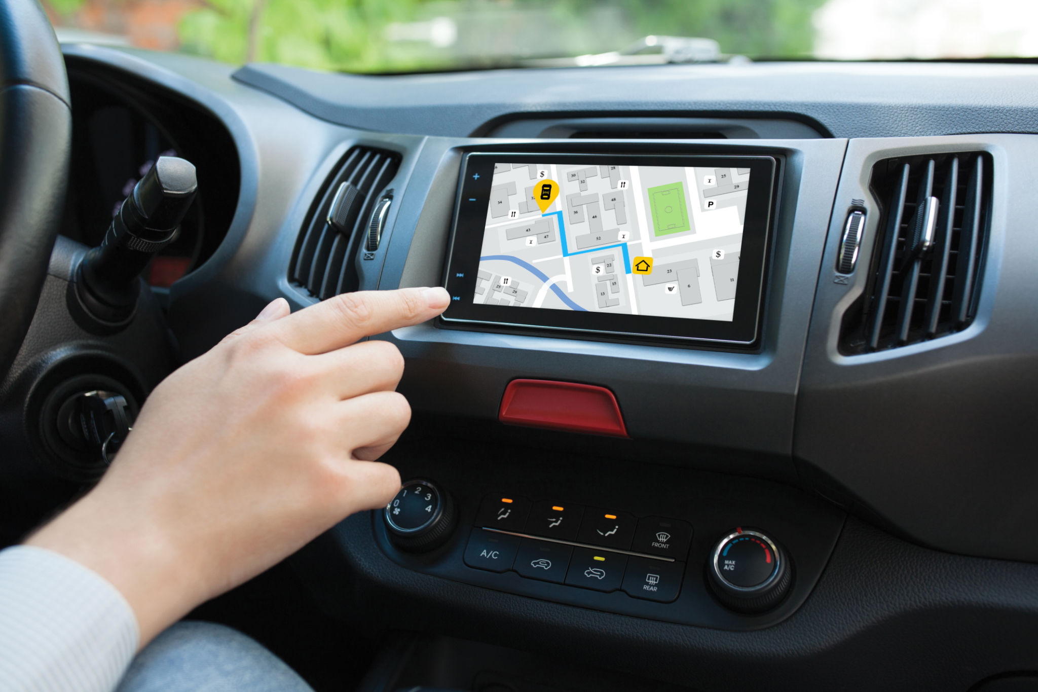 Man hand touching to screen multimedia system with application navigation Man hand touching to screen multimedia system with application navigation
