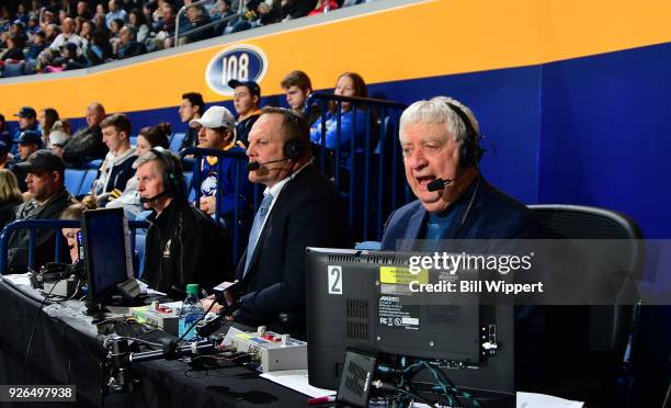 Buffalo Sabres broadcasters Rob Ray and Rick Jeanneret work seated with the fans during an NHL game against the Washington Capitals on February 19,...