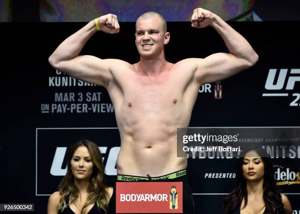 Stefan Struve of The Netherlands poses on the scale during a UFC 222 weigh-in on March 2, 2018 in Las Vegas, Nevada.