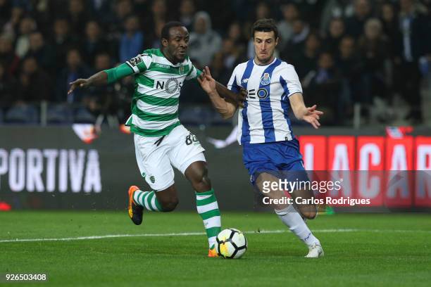 Sporting CP forward Seydou Doumbia from Ivory Coast vies with FC Porto defender Diogo Dalot from Portugal for the ball possession during the...