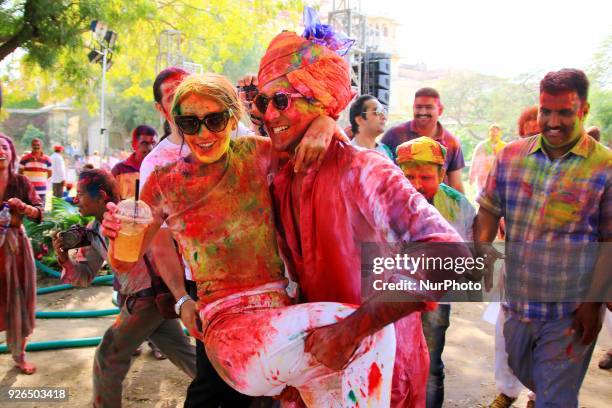 Maharaja of Royal Family Padmanabh Singh play with colors during Holi festival celebration at City Palace in Jaipur,Rajasthan, India on 2 March, 2018.