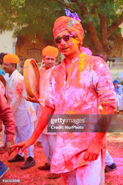 Maharaja of Royal Family Padmanabh Singh play with colors during Holi festival celebration at City Palace in Jaipur,Rajasthan, India on 2 March, 2018.