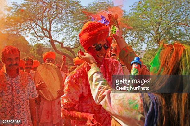 Maharaja of Royal Family Padmanabh Singh play with colors during Holi festival celebration at City Palace in Jaipur,Rajasthan, India on 2 March, 2018.