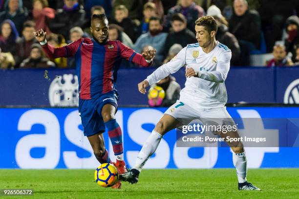 Cristiano Ronaldo of Real Madrid fights for the ball with Cheik Doukoure of Levante UD during the La Liga 2017-18 match between Levante UD and Real...