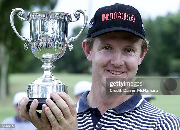 Scott Laycock from Victoria, celebrates with trophy, after winning the 2001 ANZ Victorian Open Championship, which is being played at the Cranbourne...