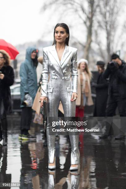 Camila Coelho is seen on the street attending Balmain during Paris Fashion Week Women's A/W 2018 Collection wearing Balmain on March 2, 2018 in...