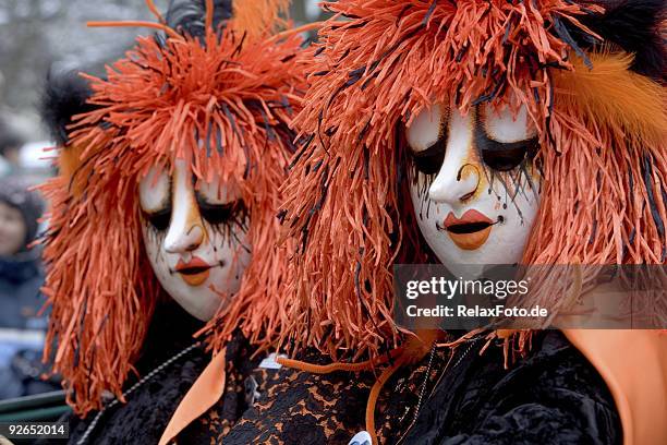 two bizarre female masks at fasnacht festival in basel (xxl) - fasnacht stock pictures, royalty-free photos & images