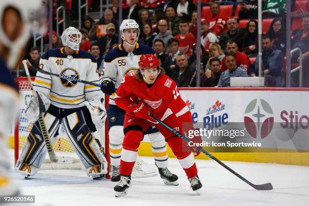 Detroit Red Wings forward David Booth gets position in front of Buffalo Sabres defenseman Rasmus Ristolainen, of Finland, and Buffalo Sabres goalie...