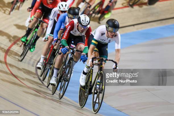 Cameron Meyer of Australia and Joao Matias of Portugal compete during the men's points race final during the UCI Track Cycling World Championships in...