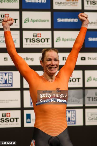 Netherland's Kirsten Wild celebrates on the podium after her victory in Women`s omnium point race during the UCI Track Cycling World Championships in...