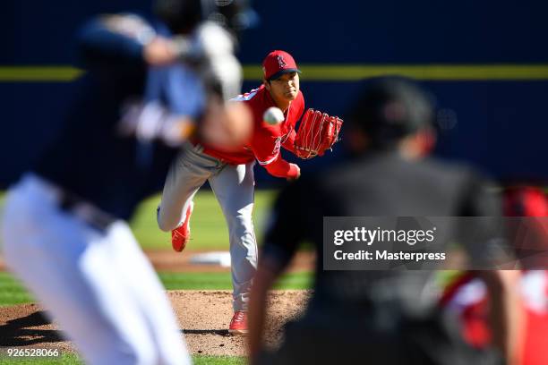 Shohei Ohtani of Los Angeles Angels pitches during the practice game against Milwaukee Brewers on March 2, 2018 at the Maryvale Baseball Park in...