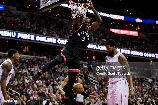 Serge Ibaka of the Toronto Raptors slam dunks against the Washington Wizards during the first half at Capital One Arena on March 2, 2018 in...