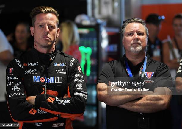James Courtney driver of the Mobil 1 Boost Mobile Racing Holden Commodore ZB and Michael Andretti team owner of Walkinshaw Andretti United look on...
