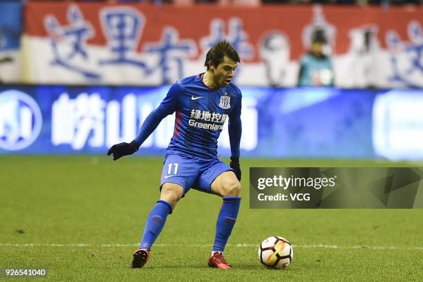 Oscar Romero of Shanghai Shenhua drives the ball during the 2018 Chinese Football Association Super League first round match between Shanghai Shenhua...