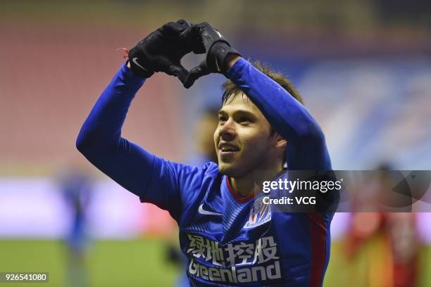 Oscar Romero of Shanghai Shenhua celebrates after scoring a goal during the 2018 Chinese Football Association Super League first round match between...