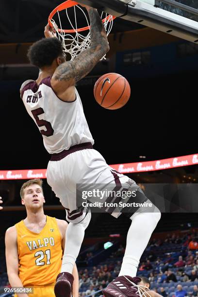 Missouri State forward Obediah Church dunks in the first half during a Missouri Valley Conference Basketball Tournament game between the Missouri...