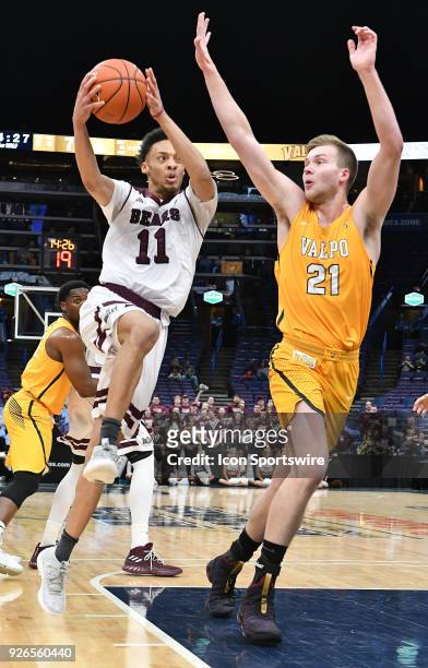 Missouri State guard Jarred Dixon drives the basket with Valparaiso center Derrik Smits defending during a Missouri Valley Conference Basketball...