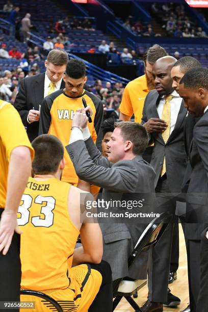 Valparaiso basketball coach Matt Lottich talks to his team during a time out during a Missouri Valley Conference Basketball Tournament game between...