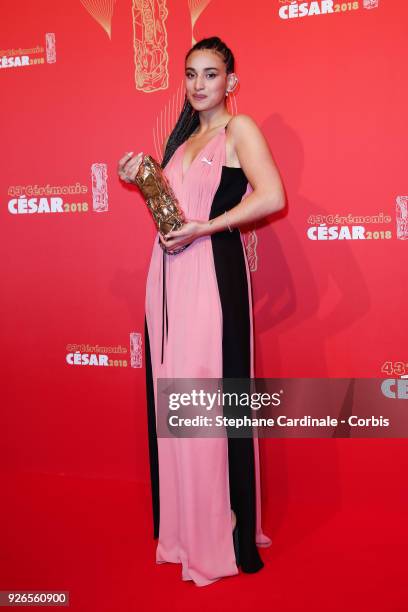 Camelia Jordana poses with the Cesar award for Best Female Newcomer for 'Le Brio' during the Cesar Film Awards at Salle Pleyel on March 2, 2018 in...