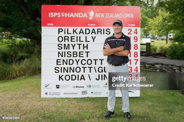 Terry Pilkadaris of Australia poses in front of the leaderboard during day three of the ISPS Handa New Zealand Golf Open at Millbrook Golf Resort on...