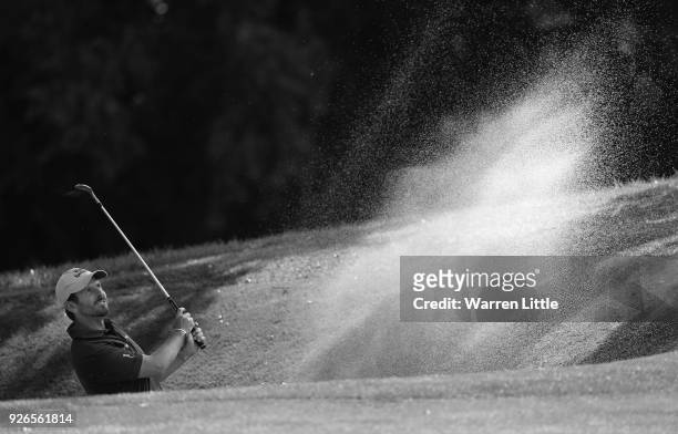 Thomas Aiken of South Africa plays out of the 11th greenside bunker during the second round of the Tshwane Open at Pretoria Country Club on March 2,...
