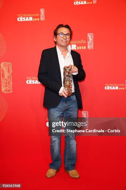 Pierre Queffelean poses with the Cesar award for Best Set Design for 'Au Revoir La Haut' during the Cesar Film Awards at Salle Pleyel on March 2,...