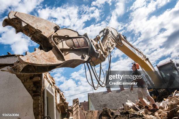 demolishing building - demolishing stock pictures, royalty-free photos & images