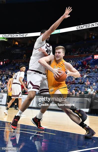 Valparaiso center Derrik Smits drives under the basket during a Missouri Valley Conference Basketball Tournament game between the Missouri State...