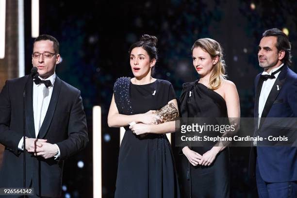 Alice Vidal and guests receive the Cesar award for Best Short Film for 'Les Bigorneaux' during the Cesar Film Awards at Salle Pleyel on March 2, 2018...