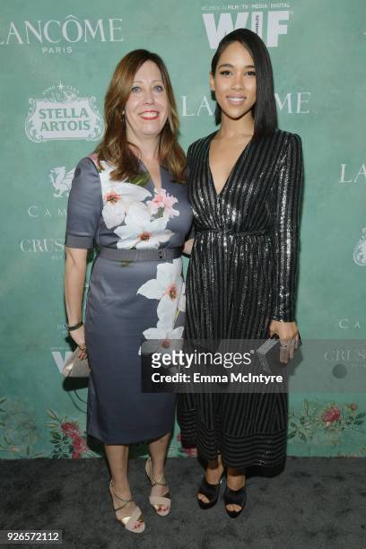 Women In Film Executive Director Kirsten Schaffer and Alexandra Shipp attend Women In Film Pre-Oscar Cocktail Party presented by Max Mara and Lancome...