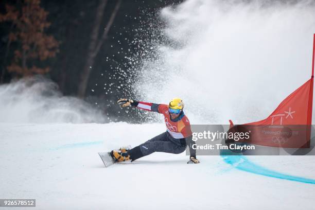Benjamin Karl of Austria in action during the Men's Snowboard Parallel Giant Slalom competition at Phoenix Snow Park on February 24, 2018 in...