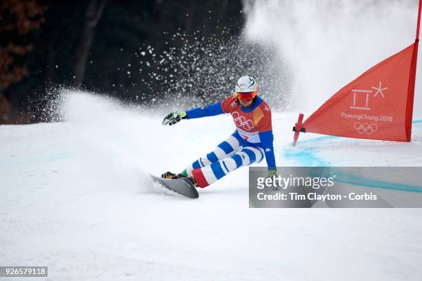 Roland Fischnaller of Italy in action during the Men's Snowboard Parallel Giant Slalom competition at Phoenix Snow Park on February 24, 2018 in...