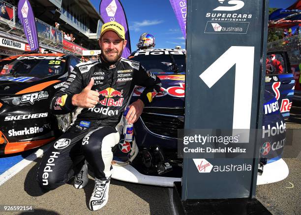 Shane Van Gisbergen driver of the Red Bull Holden Racing Team Holden Commodore ZB celebrates after winning race 1 for the Supercars Adelaide 500 on...