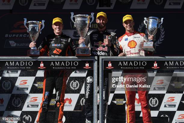 2nd place James Courtney driver of the Mobil 1 Boost Mobile Racing Holden Commodore ZB, 1st place Shane Van Gisbergen driver of the Red Bull Holden...